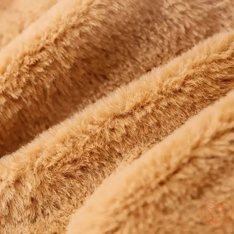 Close-up of plush fabric, showcasing soft, warm texture ideal for pet beds and cozy winter blankets.