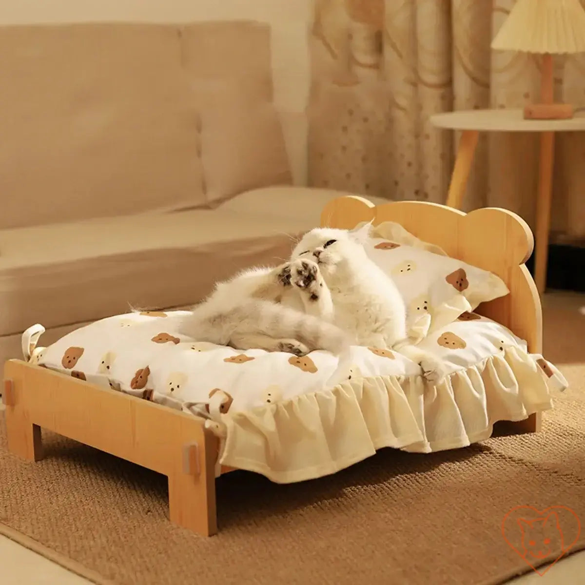 Cozy wooden cat bed with teddy bear pattern, featuring a fluffy cat lounging comfortably on a soft cushion.