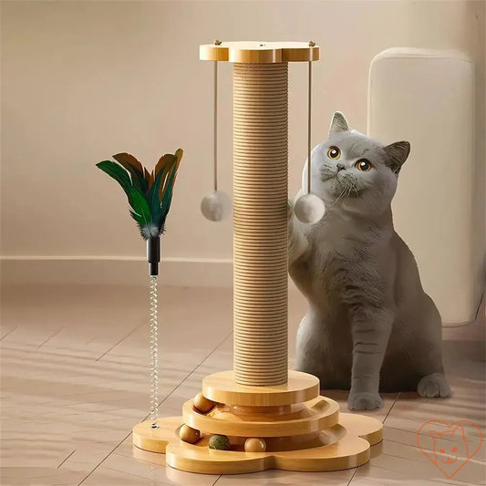 Cat playing with a wooden turntable scratching post featuring a teaser wand and sisal surface.