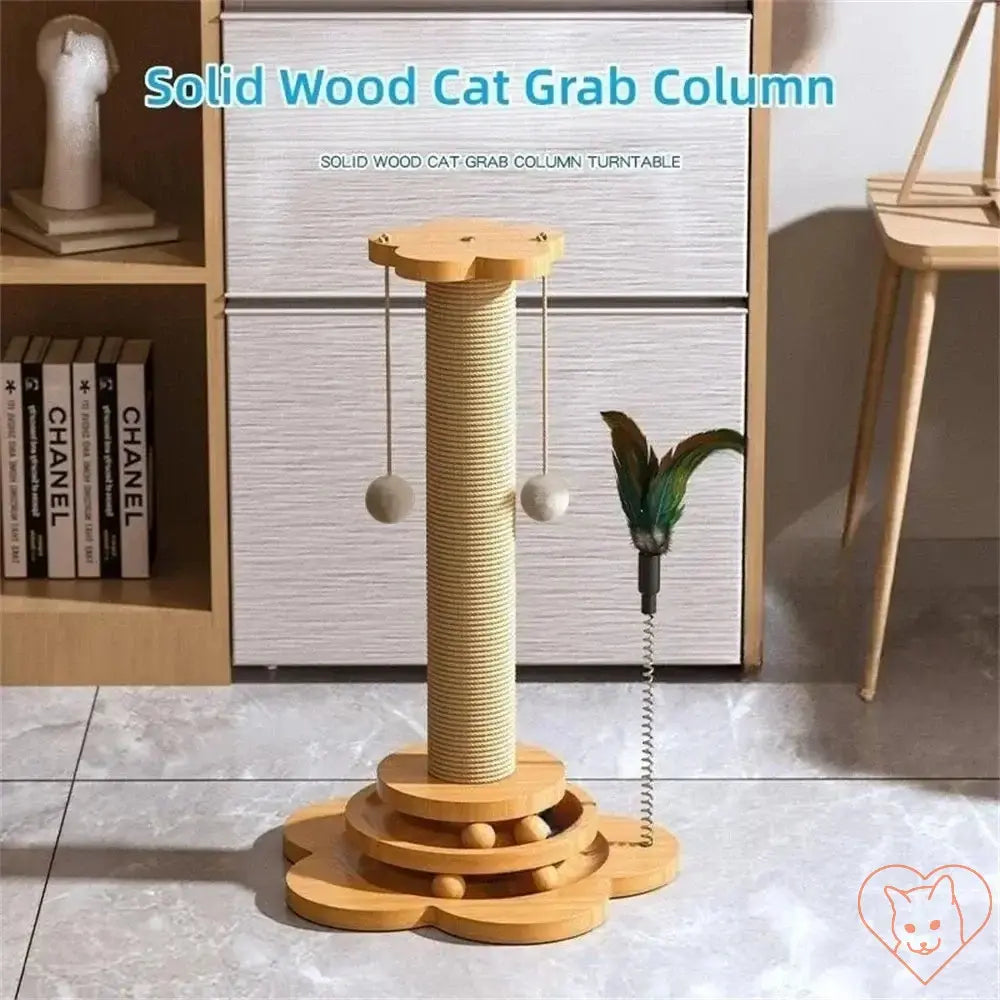 Wooden cat turntable with sisal scratching post and teaser wand for interactive play.