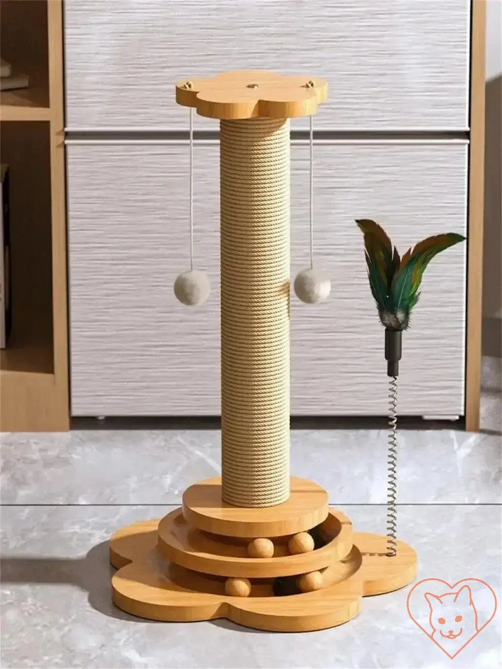 Wooden cat turntable with sisal scratching post and interactive teaser wand for playful felines.